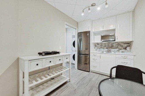 52 Sandstone Ridge Crescent, Okotoks, AB - Indoor Photo Showing Kitchen