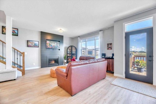 835 Lakewood Circle, Strathmore, AB - Indoor Photo Showing Living Room With Fireplace