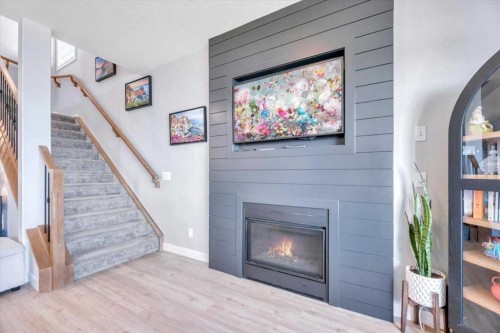 835 Lakewood Circle, Strathmore, AB - Indoor Photo Showing Living Room With Fireplace