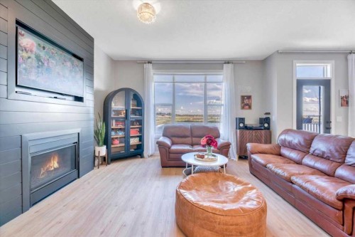 835 Lakewood Circle, Strathmore, AB - Indoor Photo Showing Living Room With Fireplace