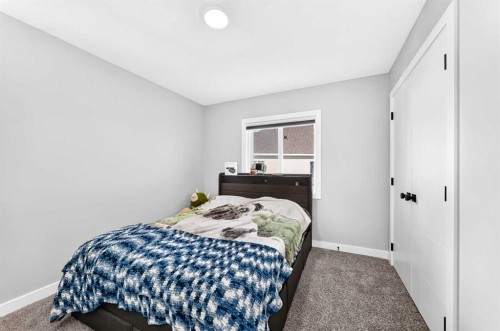263 Chelsea Heath, Chestermere, AB - Indoor Photo Showing Bedroom