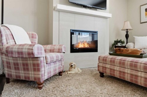 26 Cranbrook Villas Se, Calgary, AB - Indoor With Fireplace