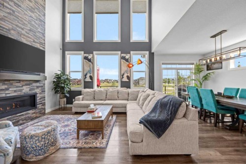 195 Evansfield Close Nw, Calgary, AB - Indoor Photo Showing Living Room With Fireplace