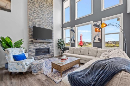 195 Evansfield Close Nw, Calgary, AB - Indoor Photo Showing Living Room With Fireplace
