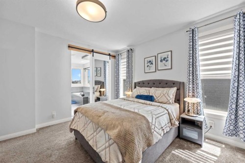195 Evansfield Close Nw, Calgary, AB - Indoor Photo Showing Bedroom