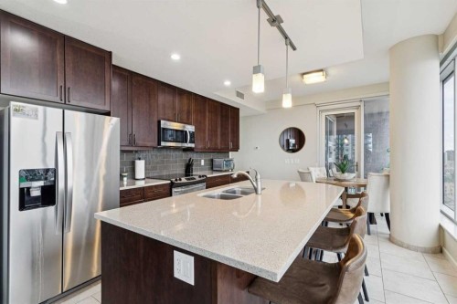 1507-211 13 Avenue Se, Calgary, AB - Indoor Photo Showing Kitchen With Stainless Steel Kitchen With Double Sink With Upgraded Kitchen