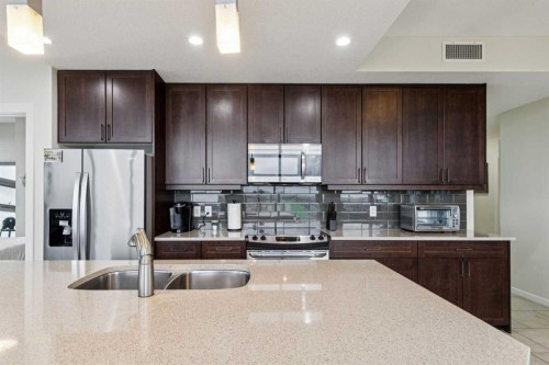 1507-211 13 Avenue Se, Calgary, AB - Indoor Photo Showing Kitchen With Stainless Steel Kitchen With Double Sink With Upgraded Kitchen