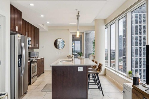 1507-211 13 Avenue Se, Calgary, AB - Indoor Photo Showing Kitchen With Stainless Steel Kitchen
