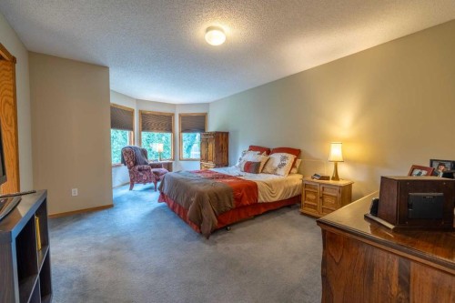 19 Mckenzie Lake Manor Se, Calgary, AB - Indoor Photo Showing Bedroom