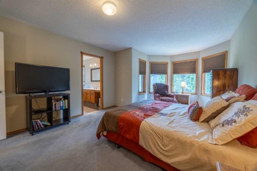 19 Mckenzie Lake Manor Se, Calgary, AB - Indoor Photo Showing Bedroom