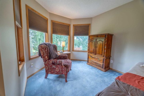 19 Mckenzie Lake Manor Se, Calgary, AB - Indoor Photo Showing Bedroom