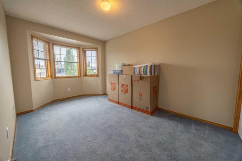 19 Mckenzie Lake Manor Se, Calgary, AB - Indoor Photo Showing Other Room
