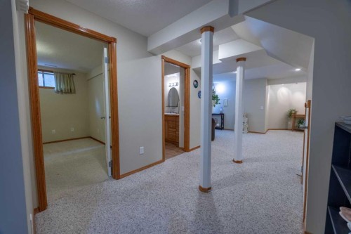 19 Mckenzie Lake Manor Se, Calgary, AB - Indoor Photo Showing Other Room