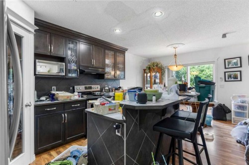 303 Bridlemeadows Common Sw, Calgary, AB 
