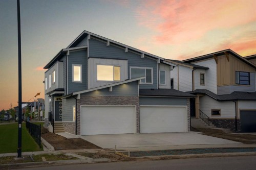 390 South Shore Drive, Chestermere, AB - Outdoor With Facade