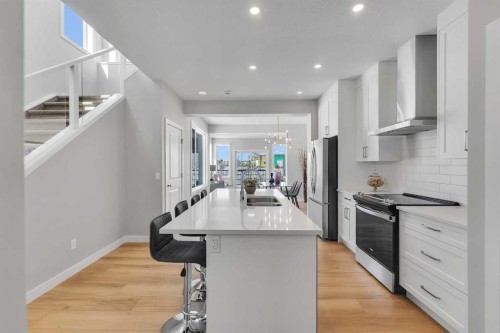 390 South Shore Drive, Chestermere, AB - Indoor Photo Showing Kitchen With Stainless Steel Kitchen With Double Sink With Upgraded Kitchen