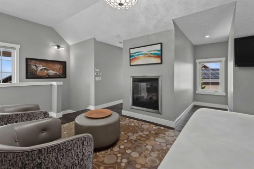 30 And 30G Victoria Cross Boulevard Sw, Calgary, AB - Indoor With Fireplace