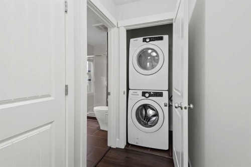 30 And 30G Victoria Cross Boulevard Sw, Calgary, AB - Indoor Photo Showing Laundry Room
