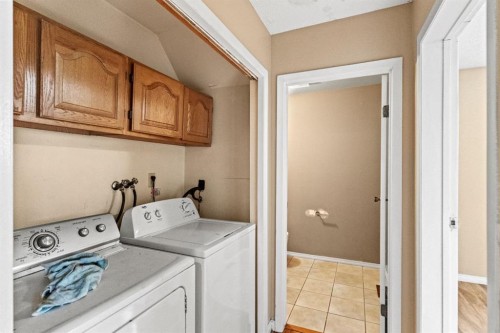 72 Templeson Way Ne, Calgary, AB - Indoor Photo Showing Laundry Room