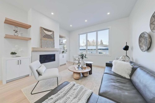 3538 43 Street Sw, Calgary, AB - Indoor Photo Showing Living Room With Fireplace