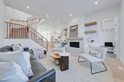 3538 43 Street Sw, Calgary, AB - Indoor Photo Showing Living Room With Fireplace