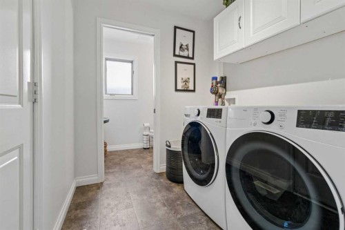 52 West Edge Road, Cochrane, AB - Indoor Photo Showing Laundry Room