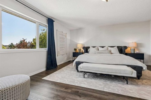 52 West Edge Road, Cochrane, AB - Indoor Photo Showing Bedroom