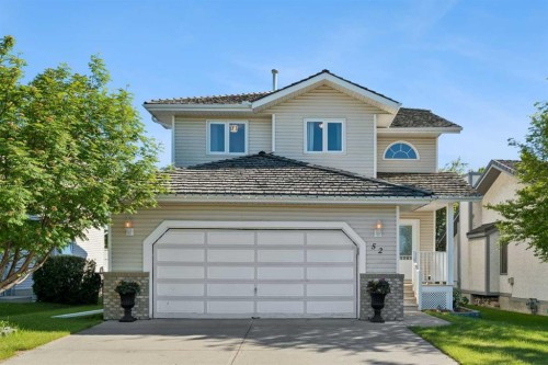 52 West Edge Road, Cochrane, AB - Outdoor With Facade