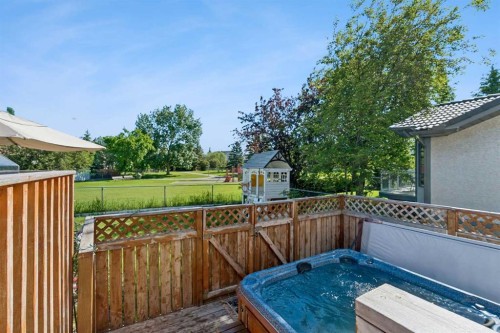 52 West Edge Road, Cochrane, AB - Outdoor With Deck Patio Veranda