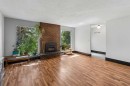 2524 106 Avenue Sw, Calgary, AB  - Indoor Photo Showing Living Room With Fireplace 