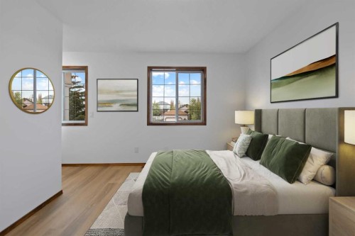 410 Long Beach Landing, Chestermere, AB - Indoor Photo Showing Bedroom
