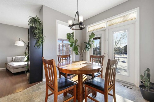 716 Boulder Creek Drive Se, Langdon, AB - Indoor Photo Showing Dining Room
