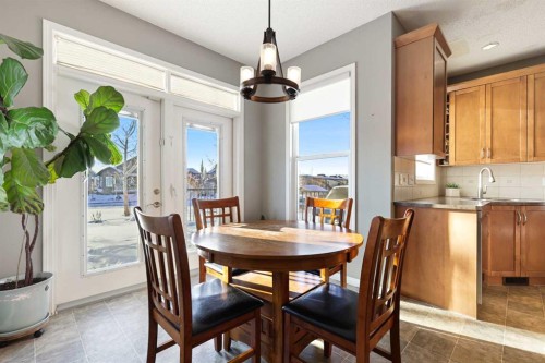 716 Boulder Creek Drive Se, Langdon, AB - Indoor Photo Showing Dining Room