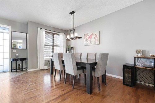 716 Boulder Creek Drive Se, Langdon, AB - Indoor Photo Showing Dining Room