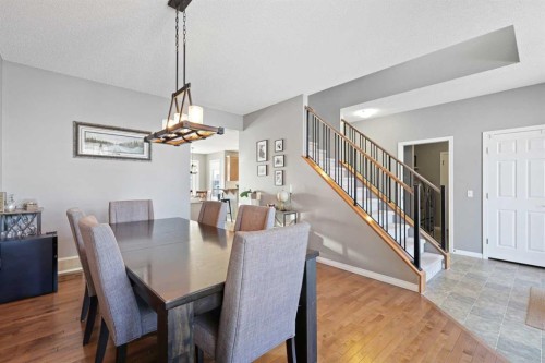 716 Boulder Creek Drive Se, Langdon, AB - Indoor Photo Showing Dining Room