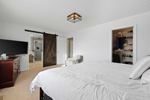 716 Boulder Creek Drive Se, Langdon, AB - Indoor Photo Showing Bedroom