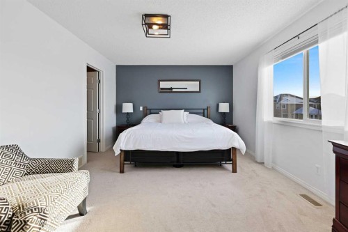 716 Boulder Creek Drive Se, Langdon, AB - Indoor Photo Showing Bedroom