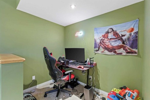 716 Boulder Creek Drive Se, Langdon, AB - Indoor Photo Showing Office