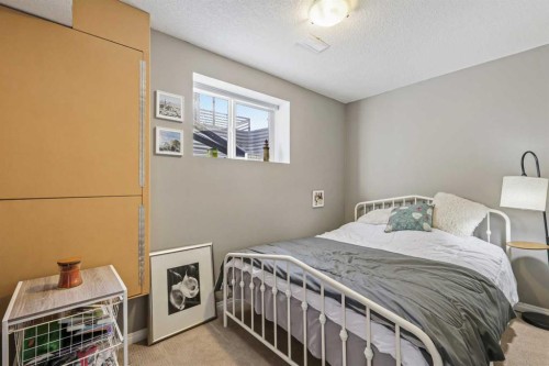 716 Boulder Creek Drive Se, Langdon, AB - Indoor Photo Showing Bedroom
