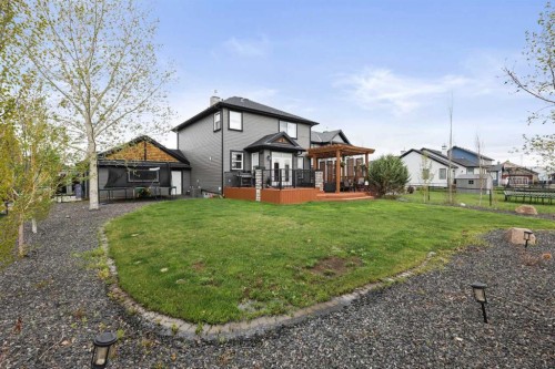 716 Boulder Creek Drive Se, Langdon, AB - Outdoor With Deck Patio Veranda