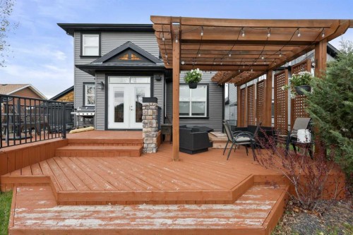 716 Boulder Creek Drive Se, Langdon, AB - Outdoor With Deck Patio Veranda With Exterior