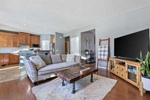 716 Boulder Creek Drive Se, Langdon, AB - Indoor Photo Showing Living Room