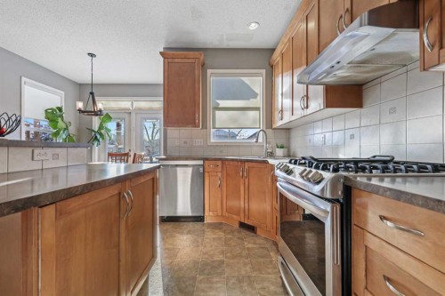 716 Boulder Creek Drive Se, Langdon, AB - Indoor Photo Showing Kitchen With Stainless Steel Kitchen