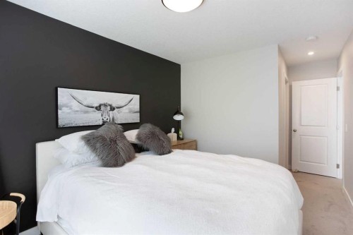 561 Canals Crossing Sw, Airdrie, AB - Indoor Photo Showing Bedroom