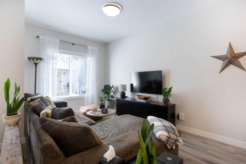 561 Canals Crossing Sw, Airdrie, AB - Indoor Photo Showing Living Room