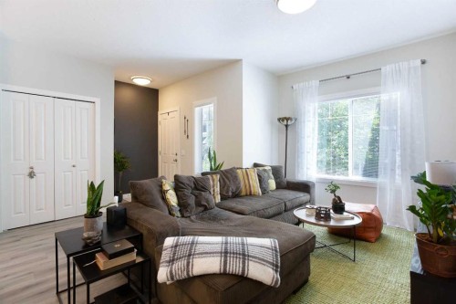 561 Canals Crossing Sw, Airdrie, AB - Indoor Photo Showing Living Room