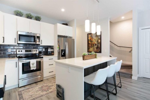 561 Canals Crossing Sw, Airdrie, AB - Indoor Photo Showing Kitchen With Upgraded Kitchen