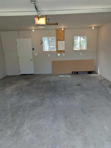 68 Abergale Way Ne, Calgary, AB - Indoor Photo Showing Garage