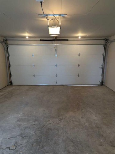 68 Abergale Way Ne, Calgary, AB - Indoor Photo Showing Garage