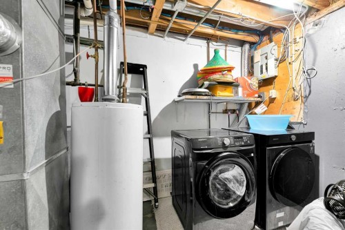 802-919 38 Street Ne, Calgary, AB - Indoor Photo Showing Laundry Room